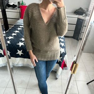 Feel warm, cozy, maybe even a little sexy in this sweater!